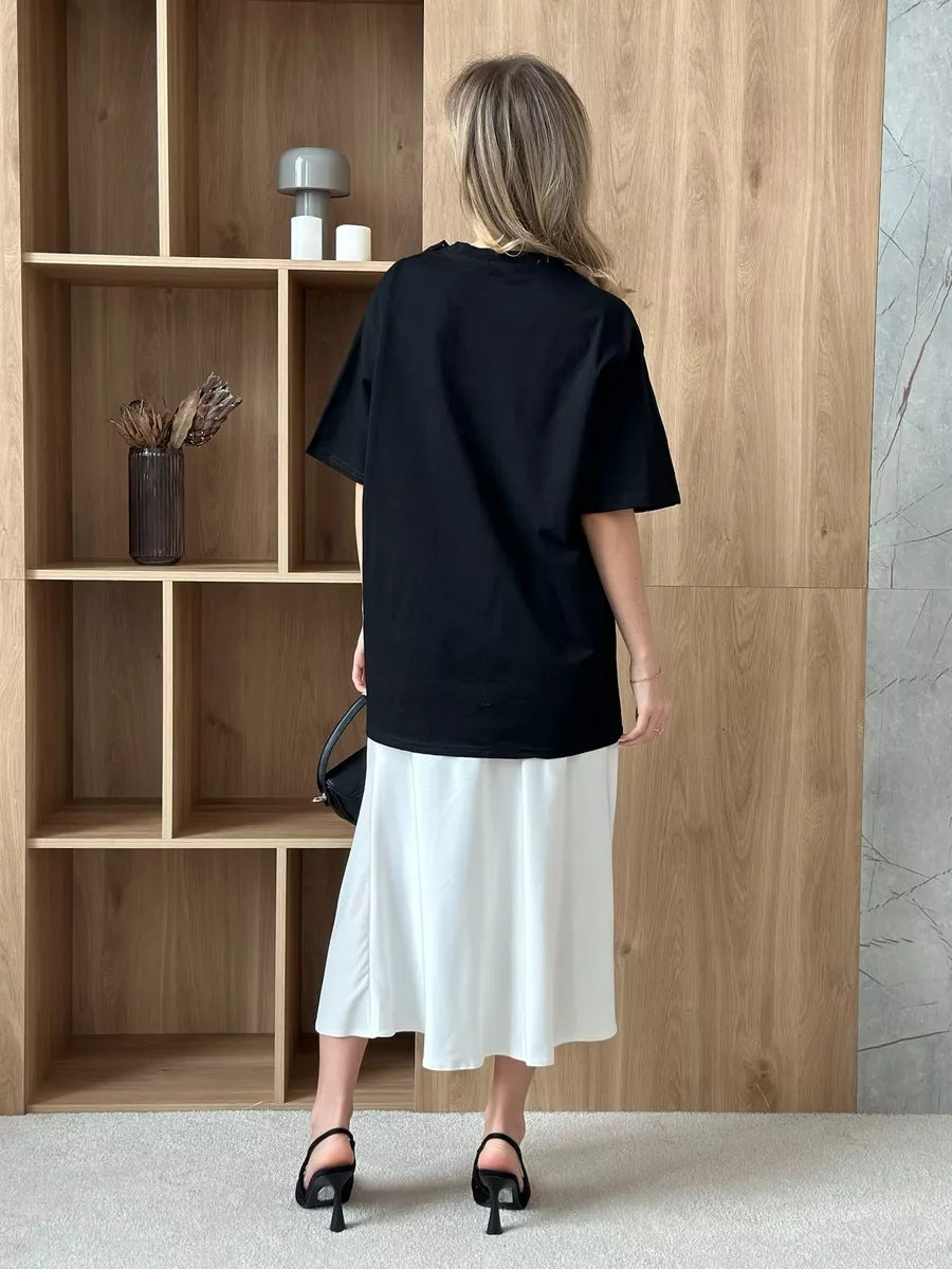 Oversized Cotton Tee with a Rhinestone Bow in Black — back view on model
