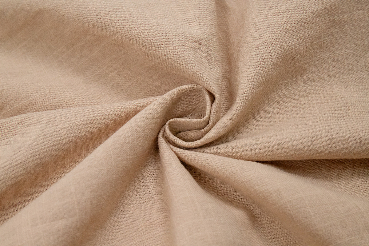 Tie-Shoulder Open-Back Cotton Maxi Dress in Apricot — close-up of the cotton weave