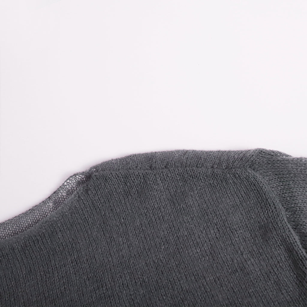 Sheer Open-Knit Bell Sleeve Sweater in Charcoal — close-up of hem