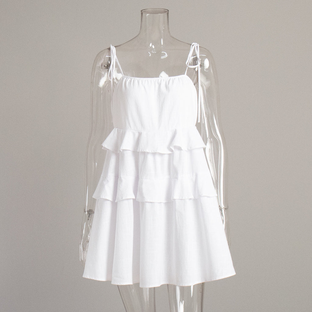 Tiered Ruffle Tie-Strap Mini Dress in White — front view on mannequin