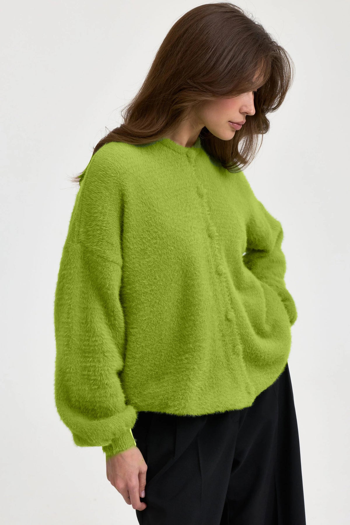Fuzzy Round Neck Button Cardigan in Lime — side view on model