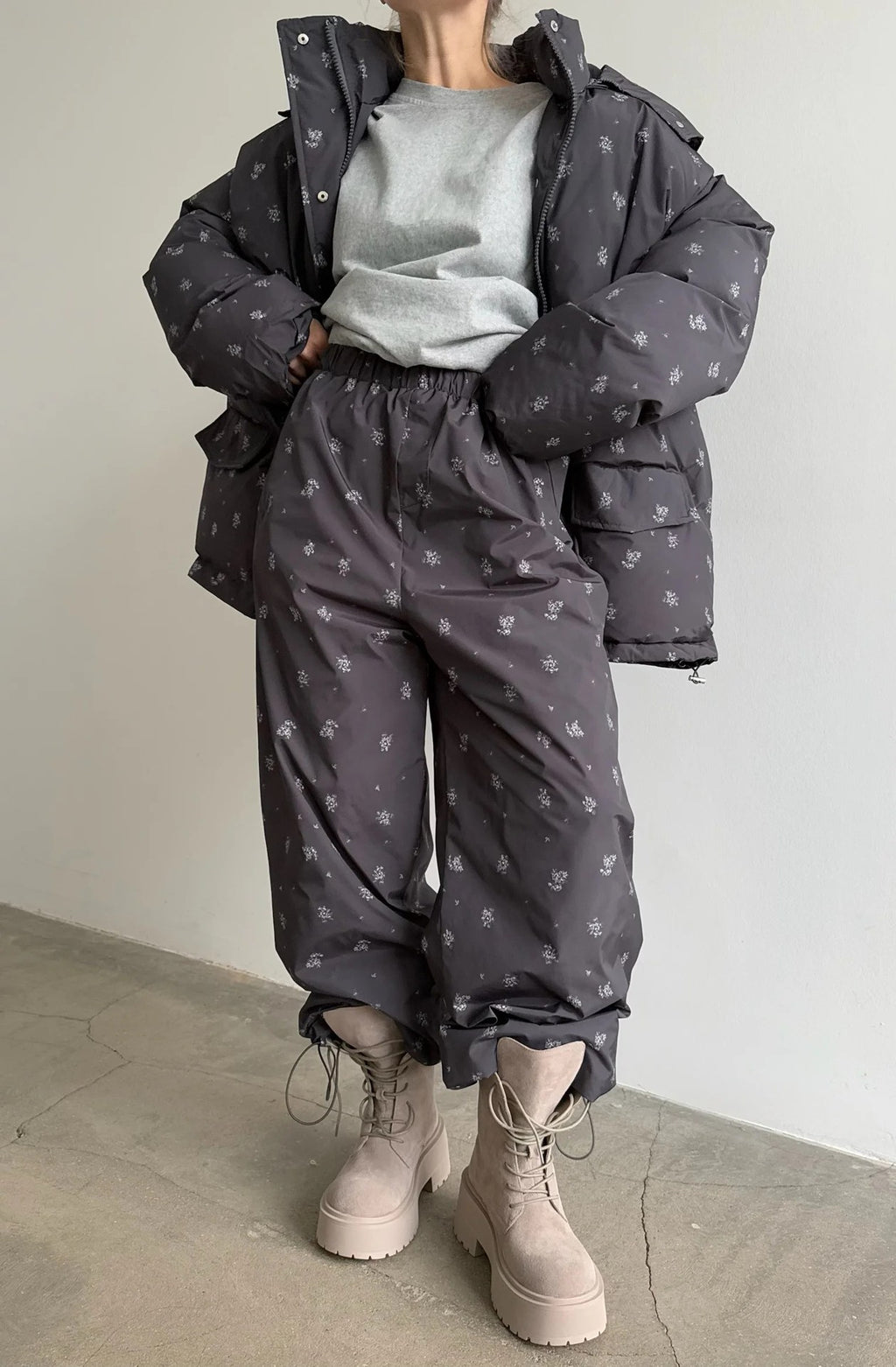 Floral Print Hooded Puffer Jacket & Drawstring Puffer Pants in Black Floral — matching set with cinched ankles, front