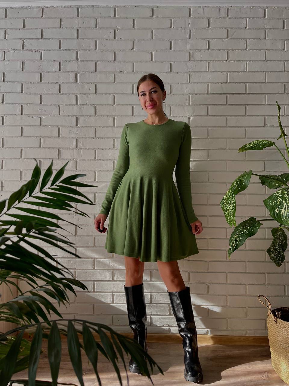 Fitted Knit Skater Mini Dress with Long Sleeves in Moss — front view on model