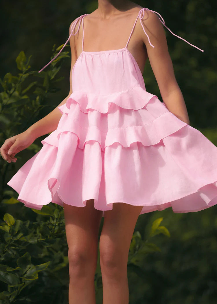 Tiered Ruffle Tie-Strap Mini Dress in Soft Pink — close-up of straps on model