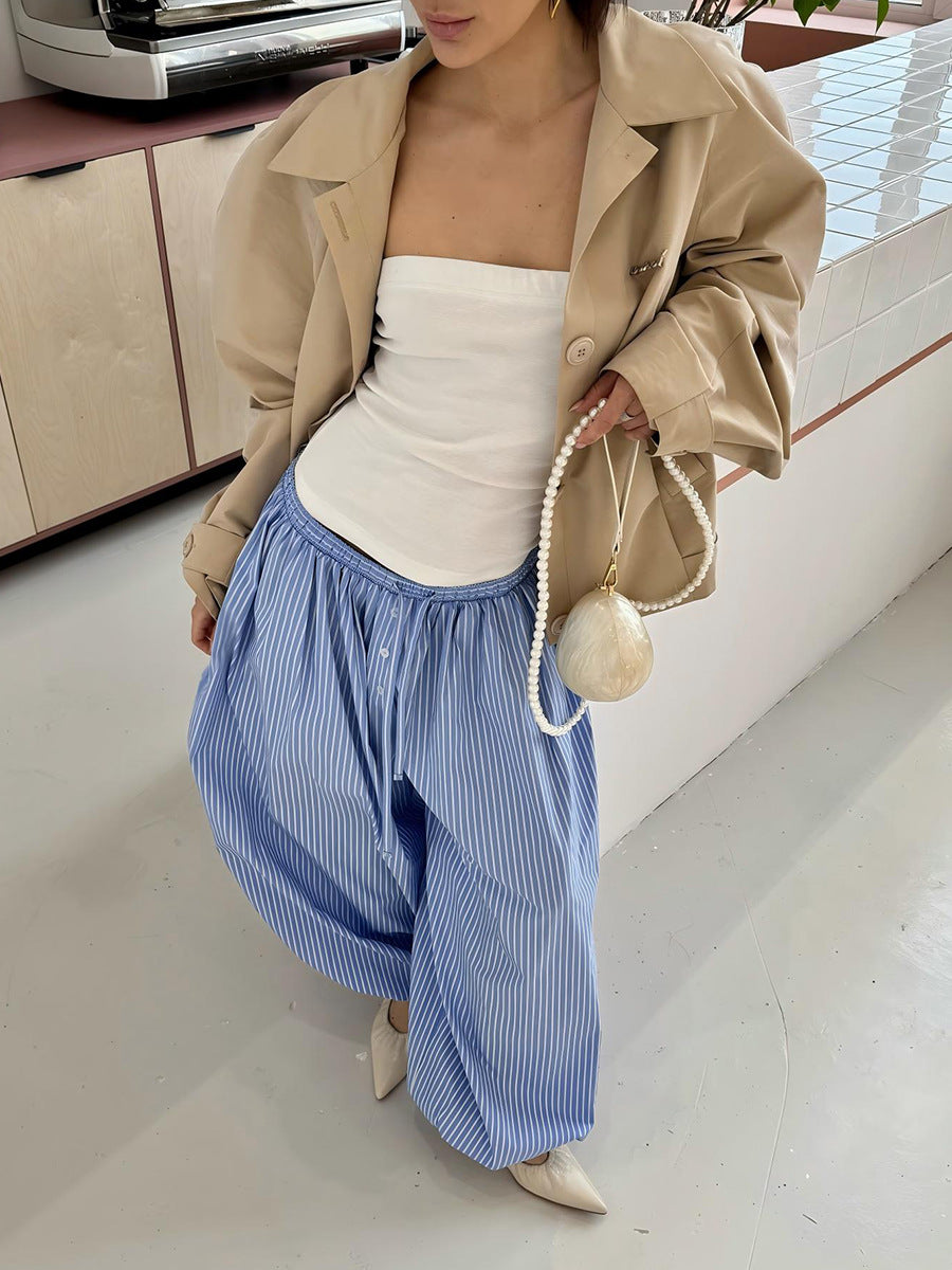 Striped Balloon Harem Pants in Blue Stripe — indoor view with blazer