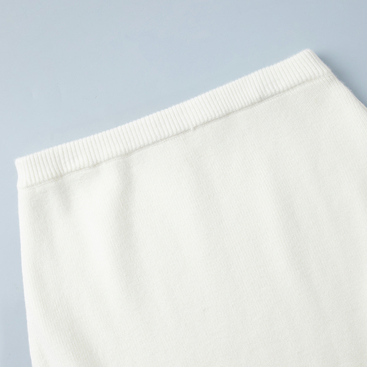 Oversized Turtleneck Sweater & Knit Maxi Skirt Set in Ivory — close-up of the skirt waistband