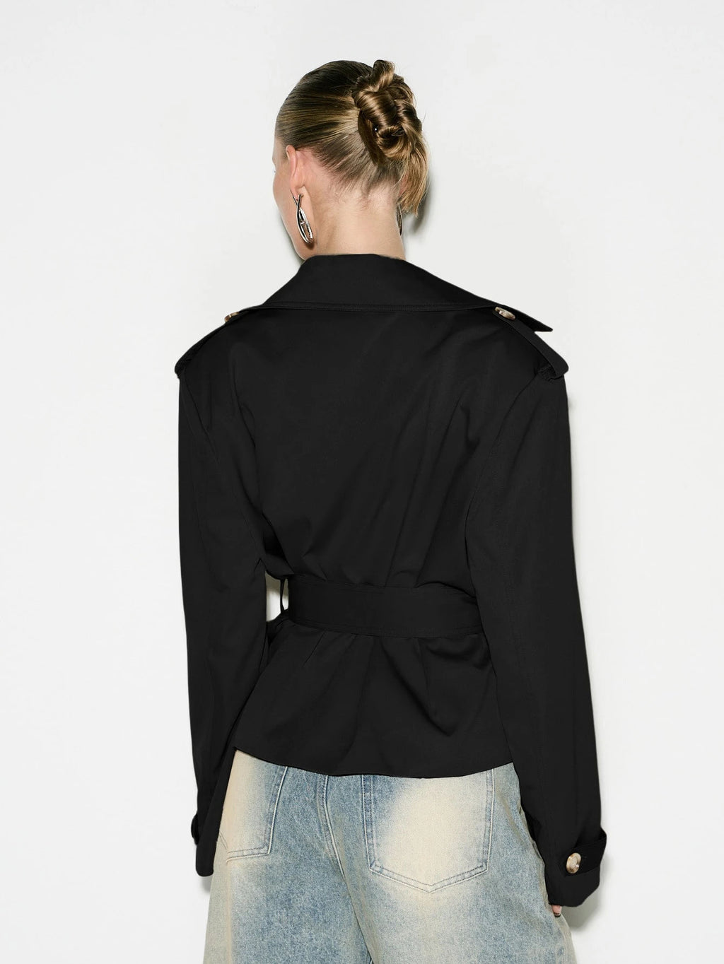 Cropped Double-Breasted Trench Jacket with Belt and Epaulettes in Black — back view on model