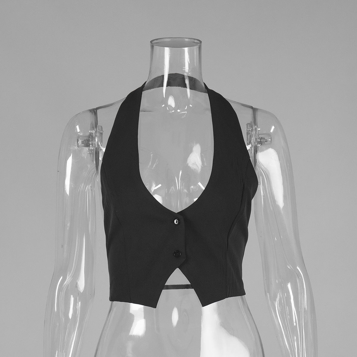 Open-Back Halter Crop Vest in Black — front view on mannequin