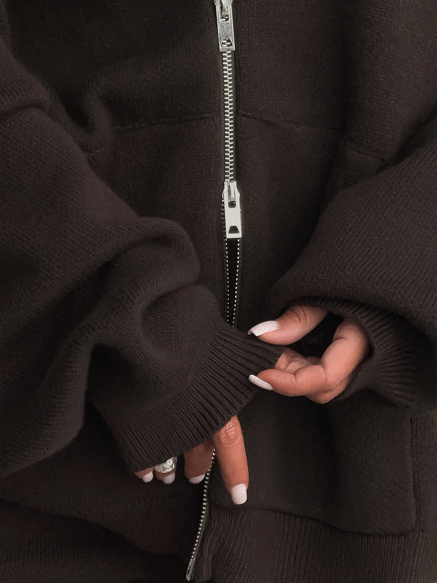 Oversized Hooded Zip-Up Knit & Drawstring Wide-Leg Pants Set in Chocolate — close-up of the zipper on model