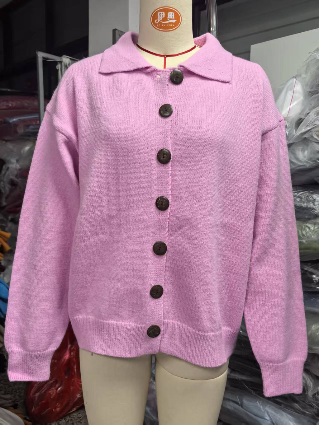 Collared Button-Front Knit Cardigan in Pink — front view on a dress form