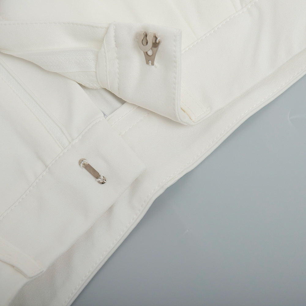 High-Waist Pleated Wide-Leg Trousers in White — close-up of hook-and-bar and zip fly