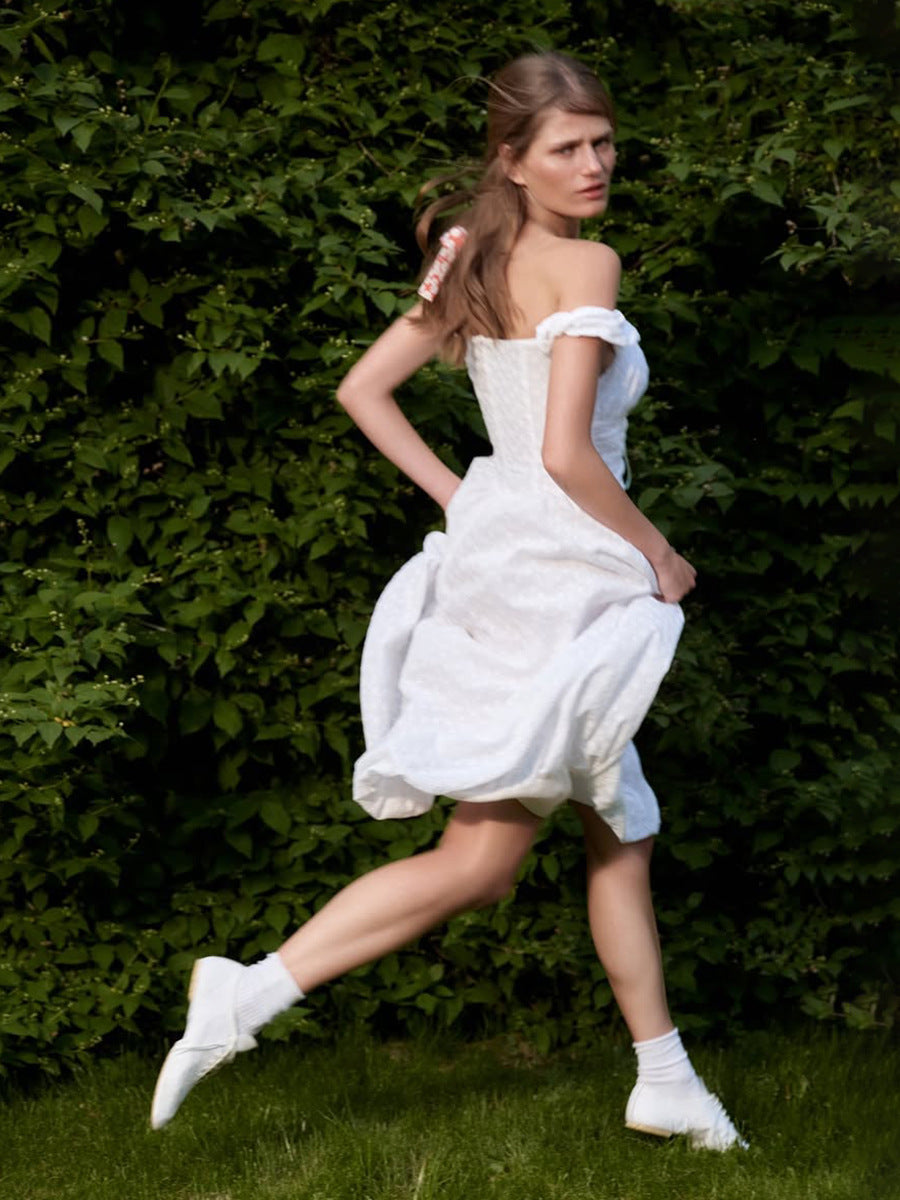 Eyelet Cotton Off-Shoulder Midi Dress in Ivory Eyelet — outdoor front on model