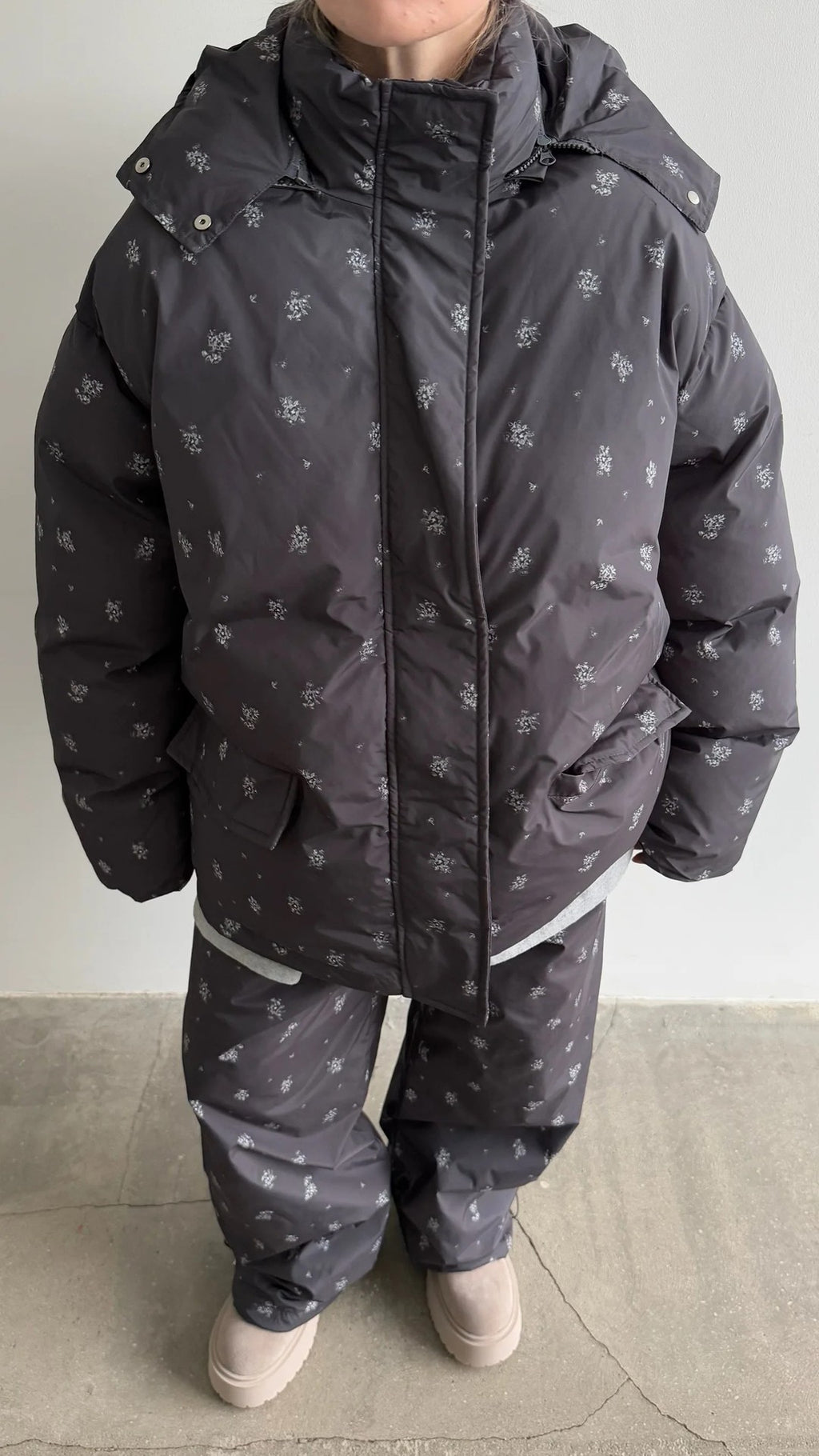 Floral Print Hooded Puffer Jacket & Drawstring Puffer Pants in Black Floral — jacket zipped, front