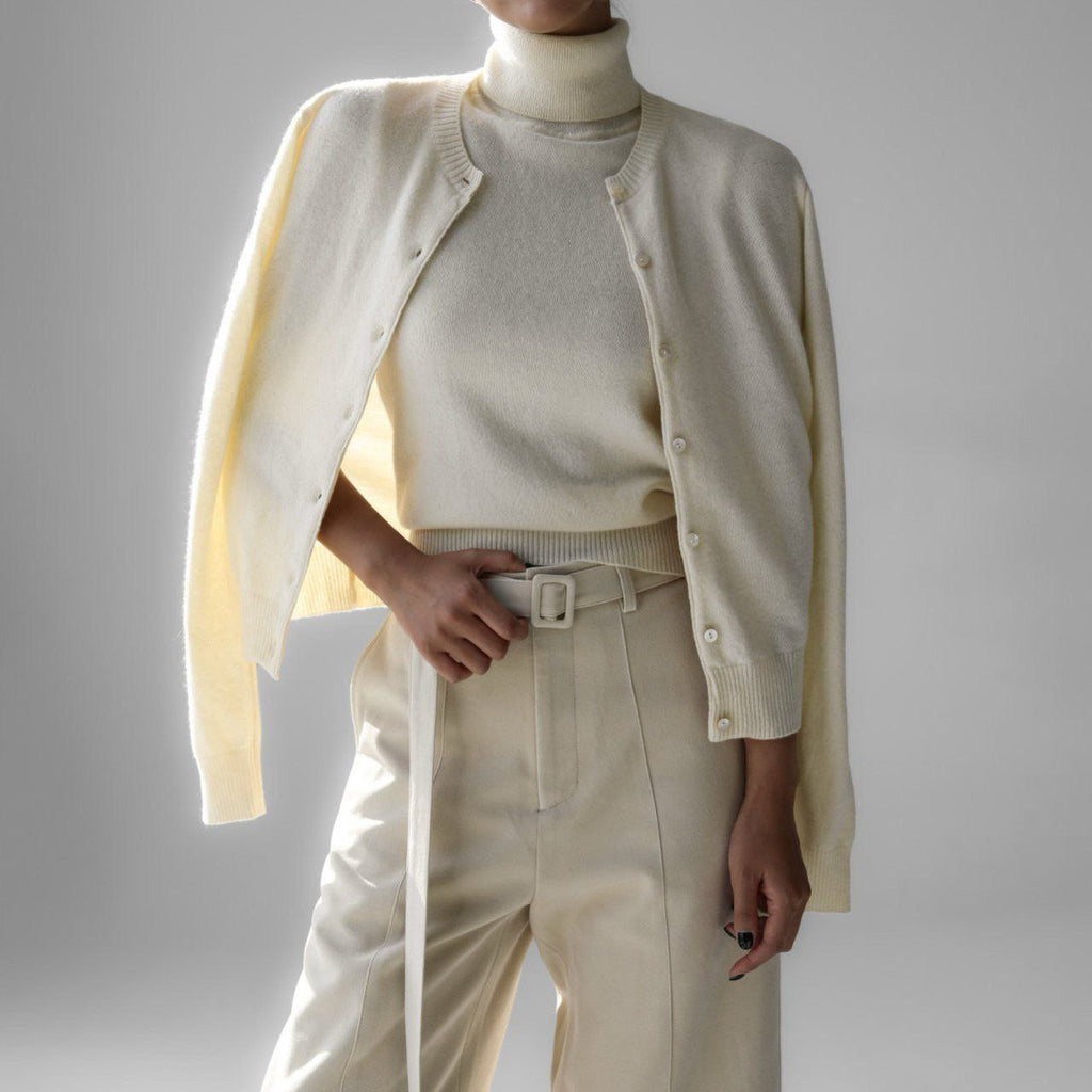 Sleeveless Turtleneck Knit Top & Cardigan Twin Set in Ivory — set worn together on model