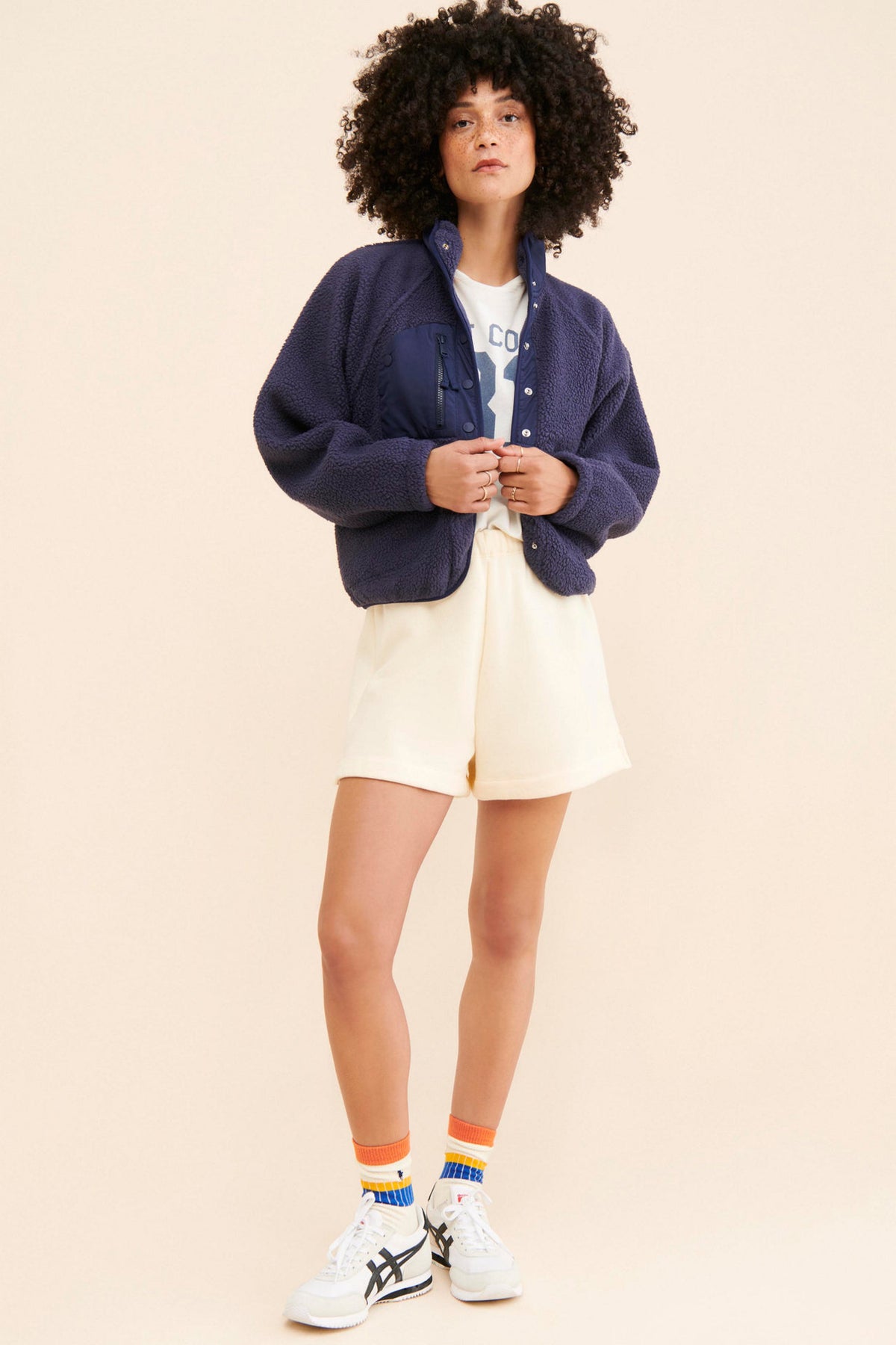 Cropped Sherpa Fleece Jacket with Stand Collar in Navy — full-length view on model