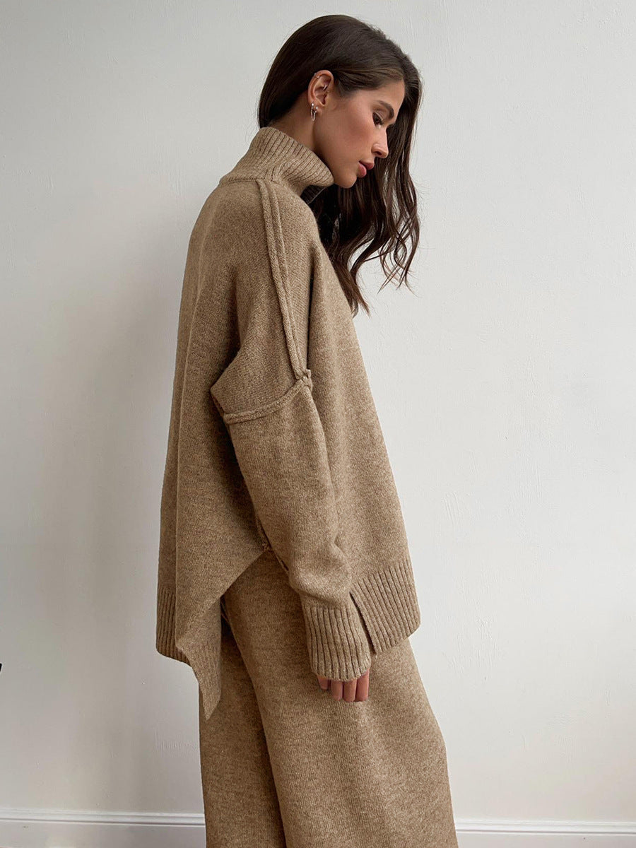 Oversized Turtleneck Sweater & Wide-Leg Knit Pants Set in Camel — side view showing the split hem
