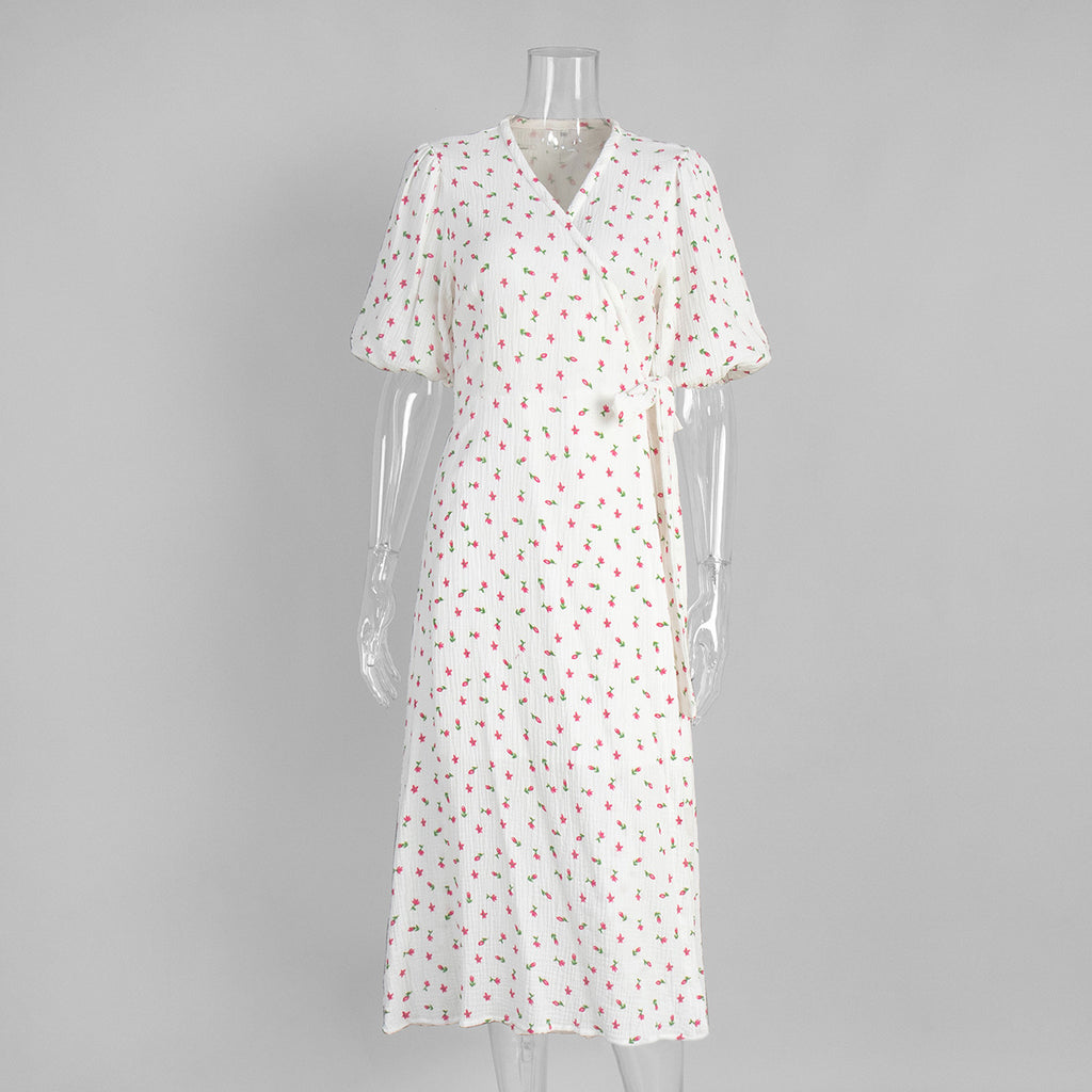 Cotton Floral Puff-Sleeve Wrap Midi Dress in Pink Floral — front on mannequin