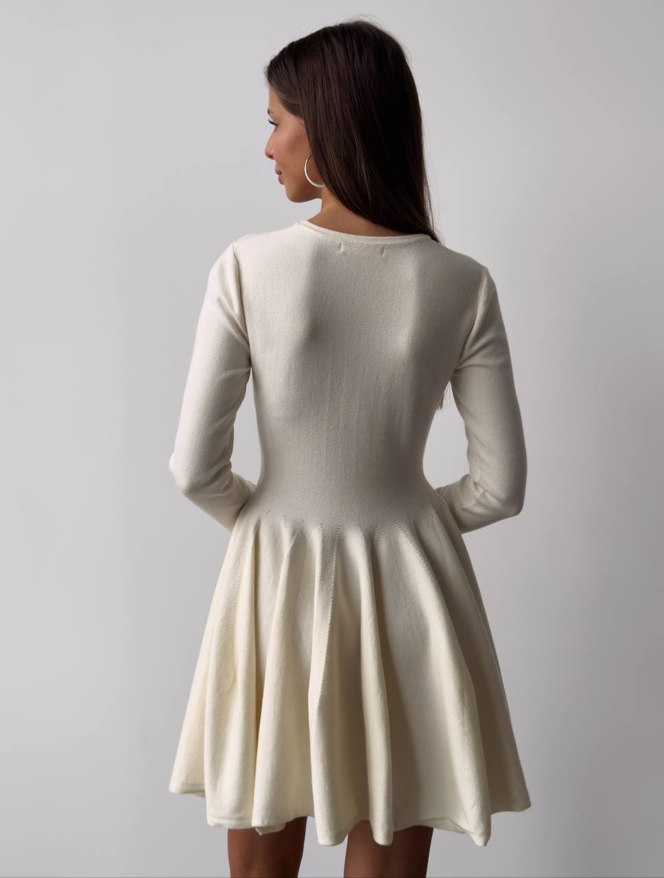 Fitted Knit Skater Mini Dress with Long Sleeves in Ivory — back view on model