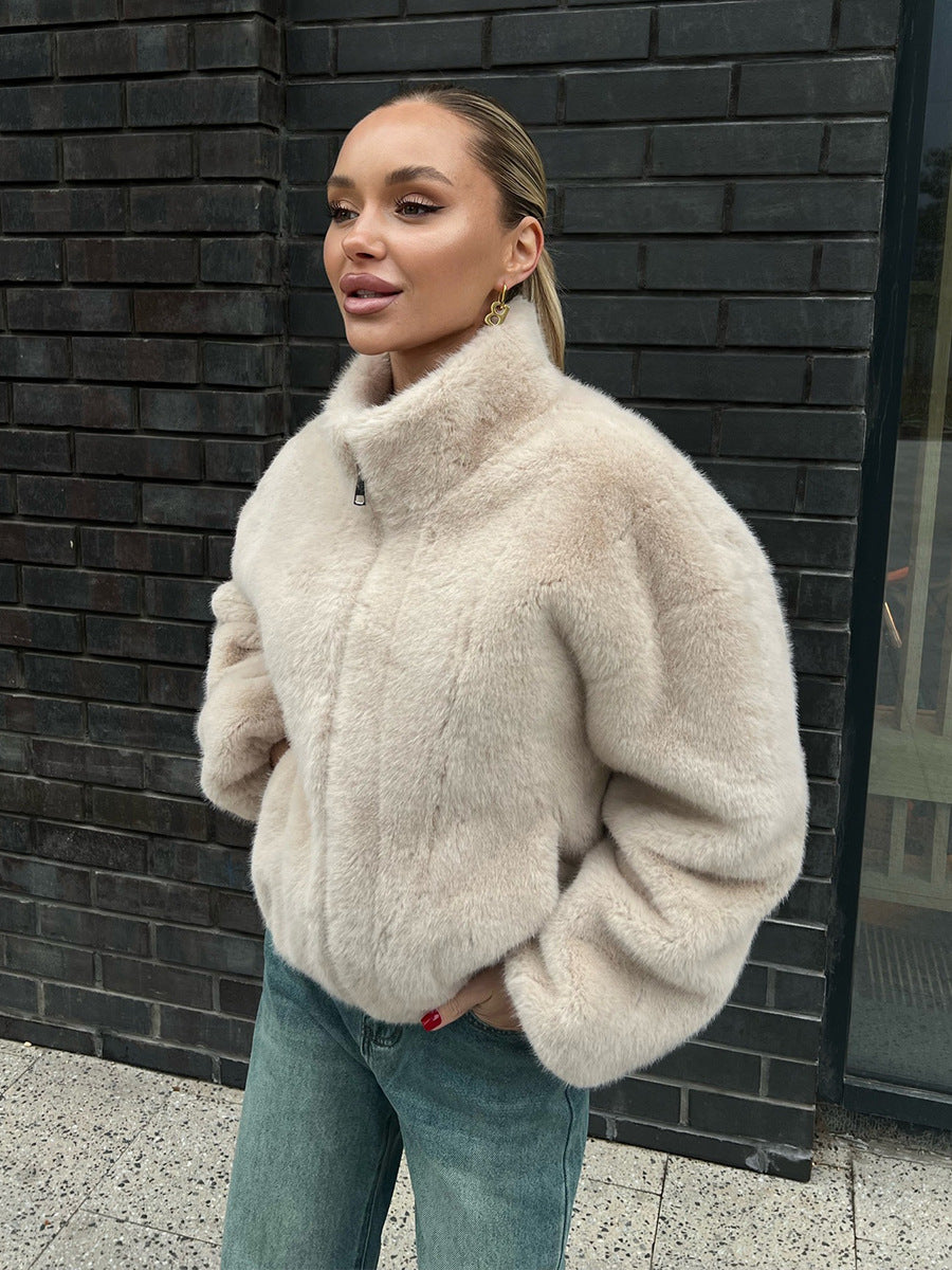 Plush Faux Fur Zip-Up Jacket with Stand Collar in Cream — front view on model, zipped up