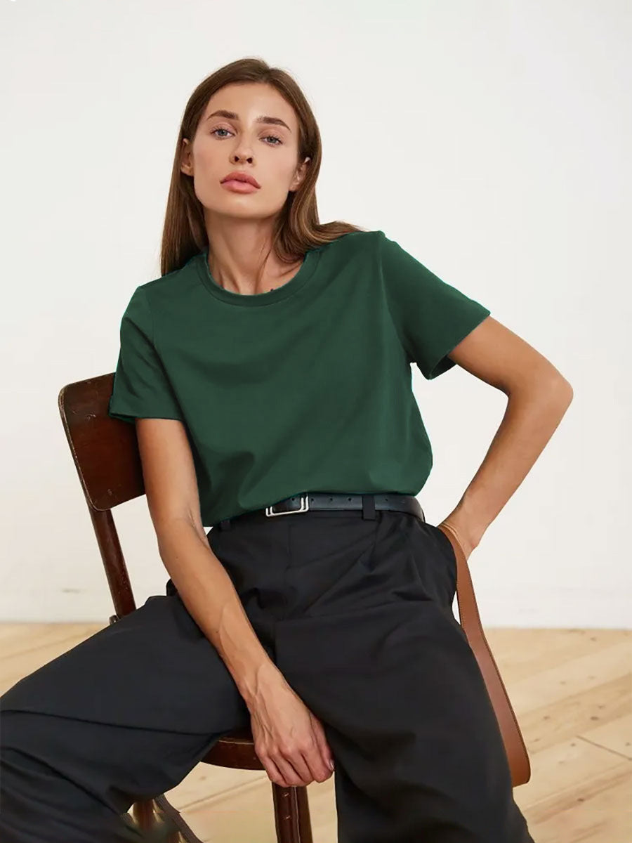 Everyday Cotton Short Sleeve Crew Tee in Forest Green — seated on model