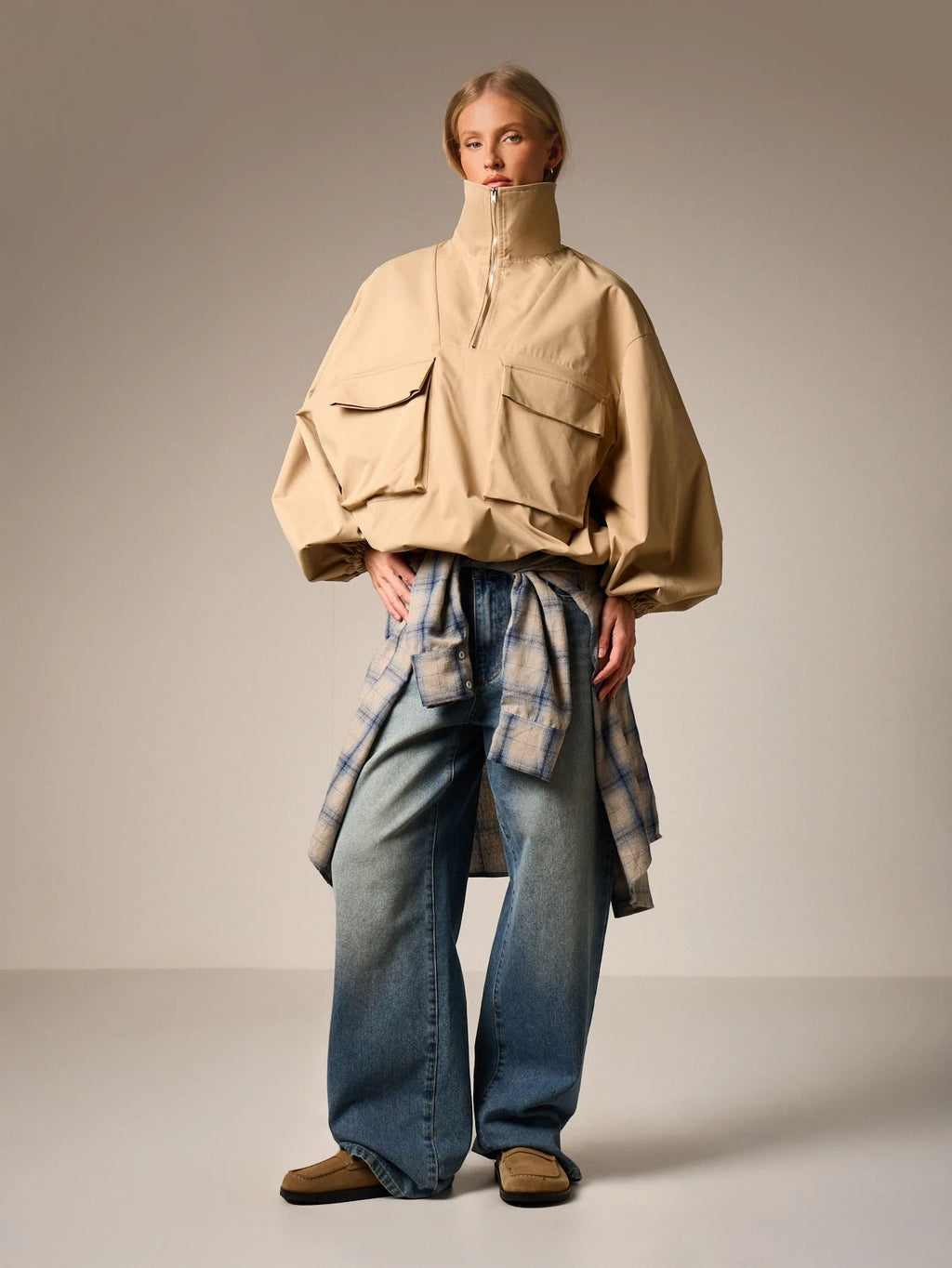 Oversized Half-Zip Funnel-Neck Windbreaker Jacket in Khaki — full-length view on model