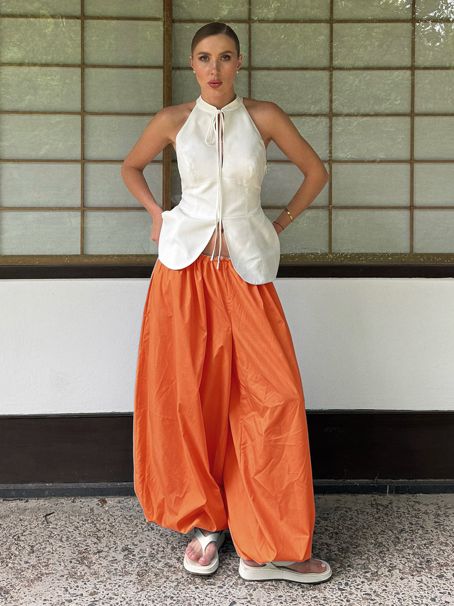 Cotton Balloon Lantern Pants in Tangerine — front view on model