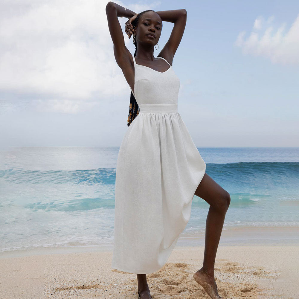 Tie-Shoulder Open-Back Cotton Maxi Dress in White — front view on model, beach