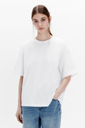 Relaxed Cotton Crew-Neck Tee in White — front view on model