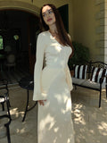 Ribbed V-Neck Button Cardigan & Fitted Knit Maxi Skirt Set in Ivory — full-length front view on model