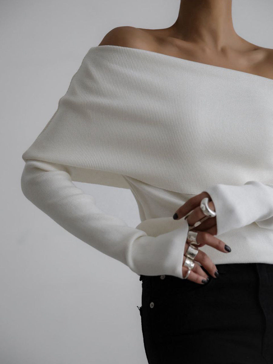 Off-Shoulder Fold-Over Knit Sweater in Ivory — front view on model