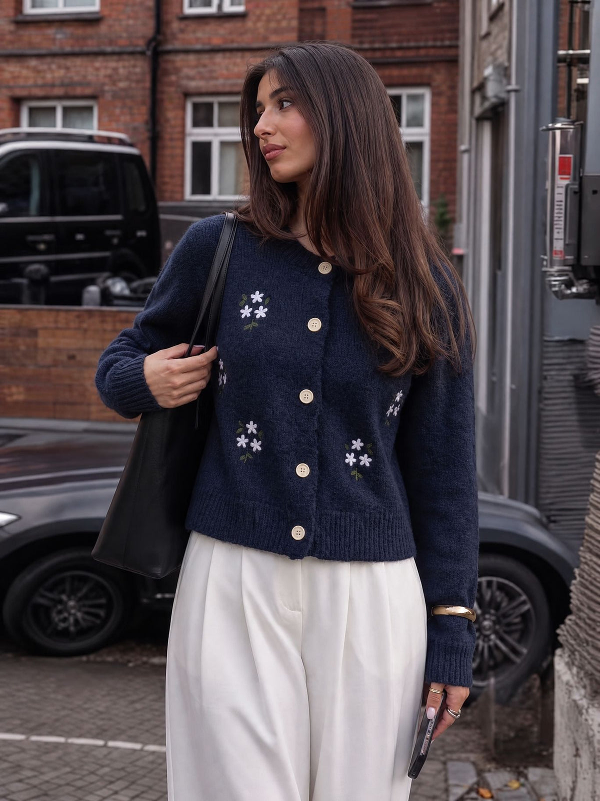 Floral Embroidered Button Cardigan in Navy — front view on model