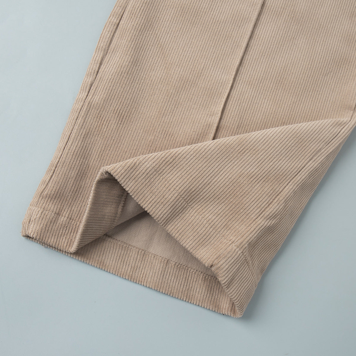 Cotton Corduroy Wide-Leg Pants with Pintuck Front in Light Khaki — close-up of the hem