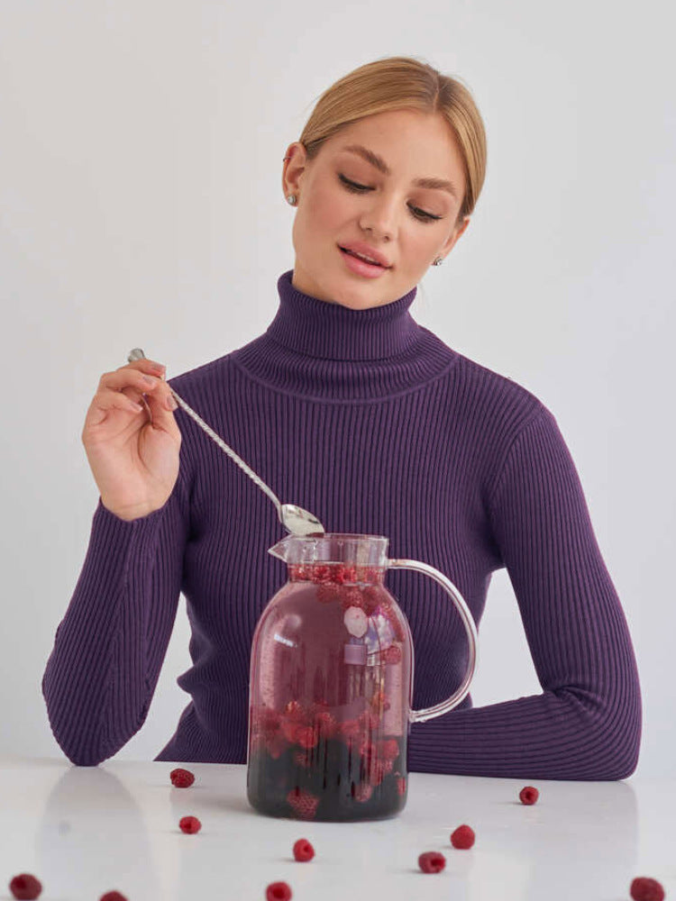 Fitted Ribbed Turtleneck Sweater in Plum Purple — front view