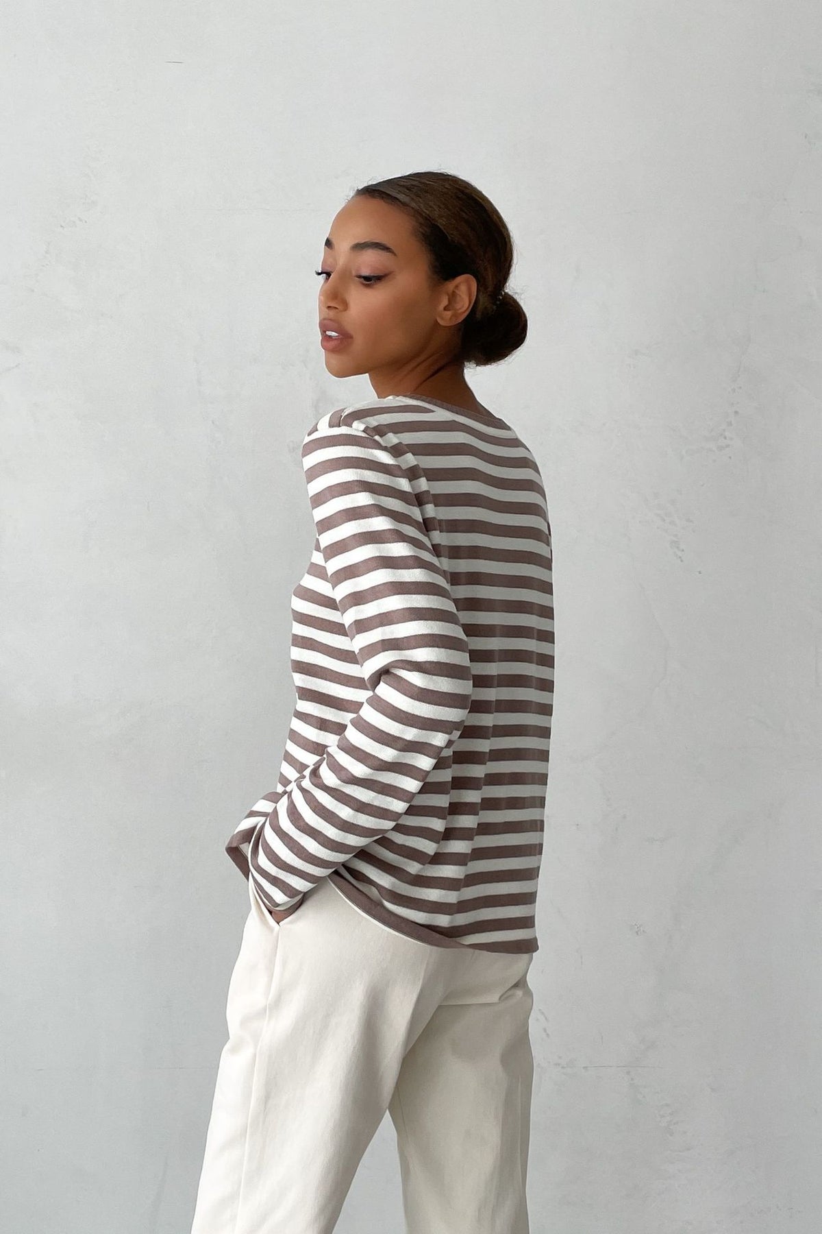 Relaxed Striped Crew Neck Sweater in Mocha Stripe — side view on model