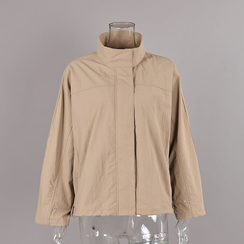 Oversized Stand-Collar Nylon Jacket with Drawcord Hem in Khaki — front view on mannequin