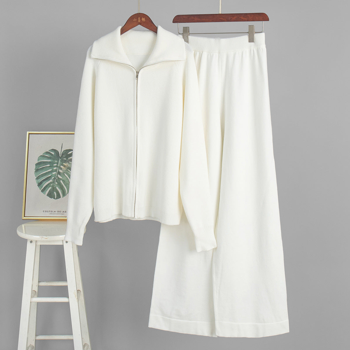 Wide-Collar Zip-Up Knit Cardigan & Wide-Leg Pants Set in Ivory — set on hanger