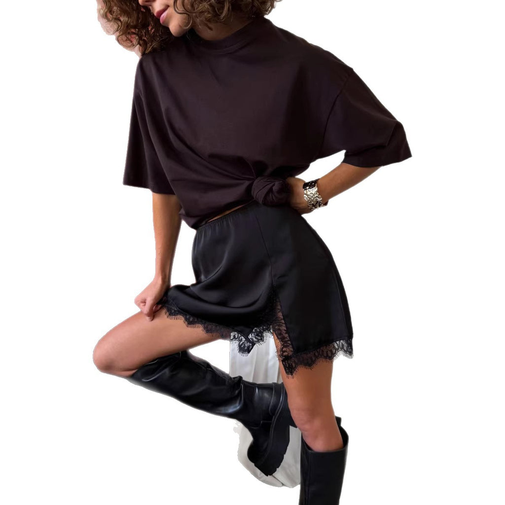 Lace-Trim Satin Mini Skirt in Black — side view on model