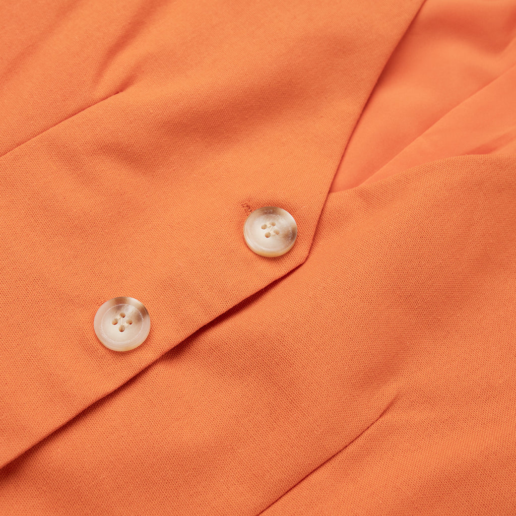 Linen Vest & Maxi Skirt Set in Orange — close-up of vest hem and buttons