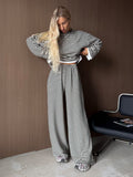 Striped Cropped Top & Wide-Leg Pants Lounge Set in Black & White Stripe — full-length front view on model