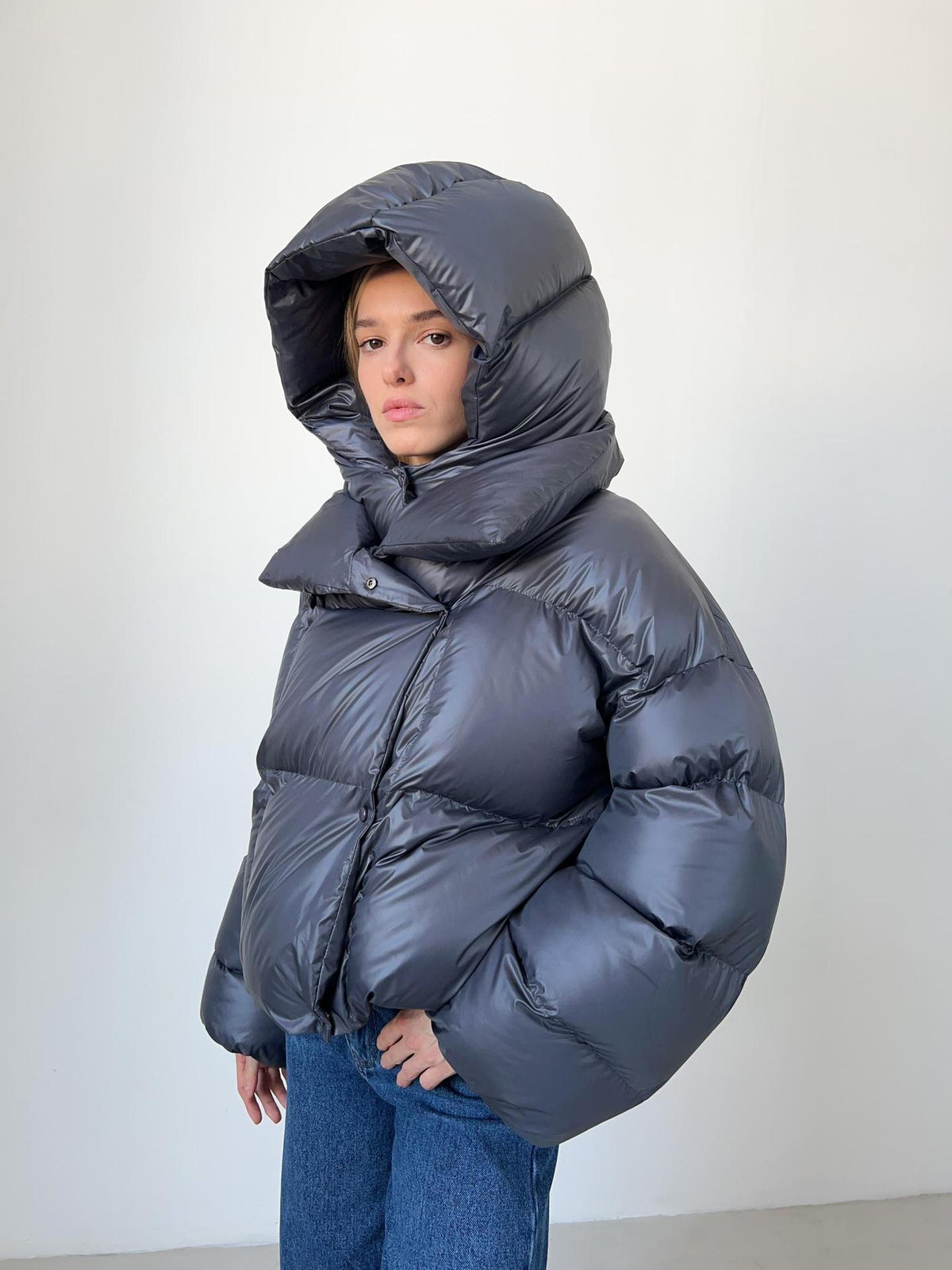 Cropped Hooded Puffer Jacket with Drawstring Hem in Slate Gray — hood up on model