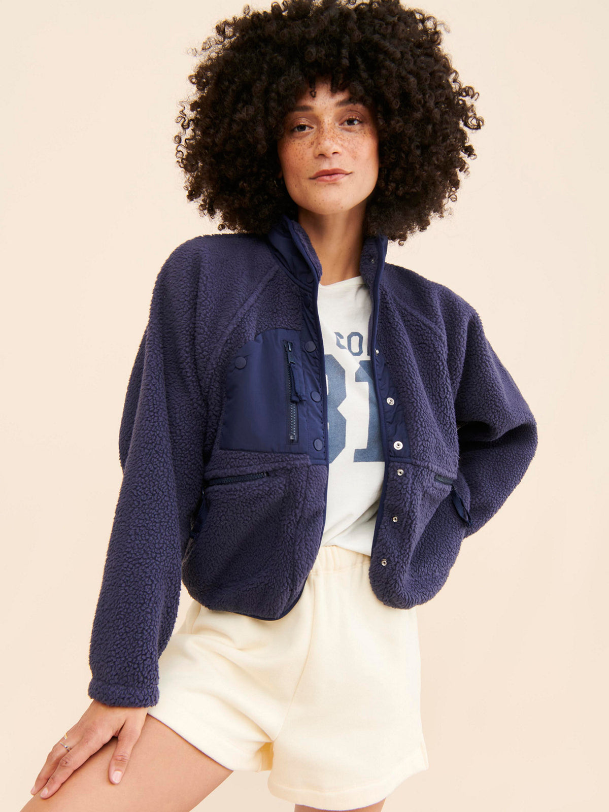 Cropped Sherpa Fleece Jacket with Stand Collar in Navy — front view on model