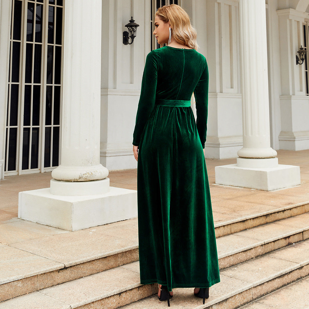 Long-Sleeve Velvet Maxi Dress with Tie Waist in Emerald — back view on model