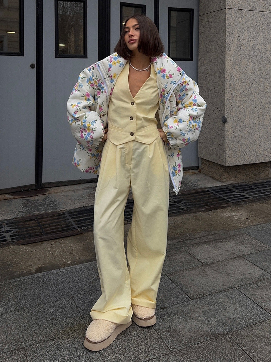 Floral Print Puffer Jacket with Stand Collar in Cream Floral — full-length view with yellow trousers