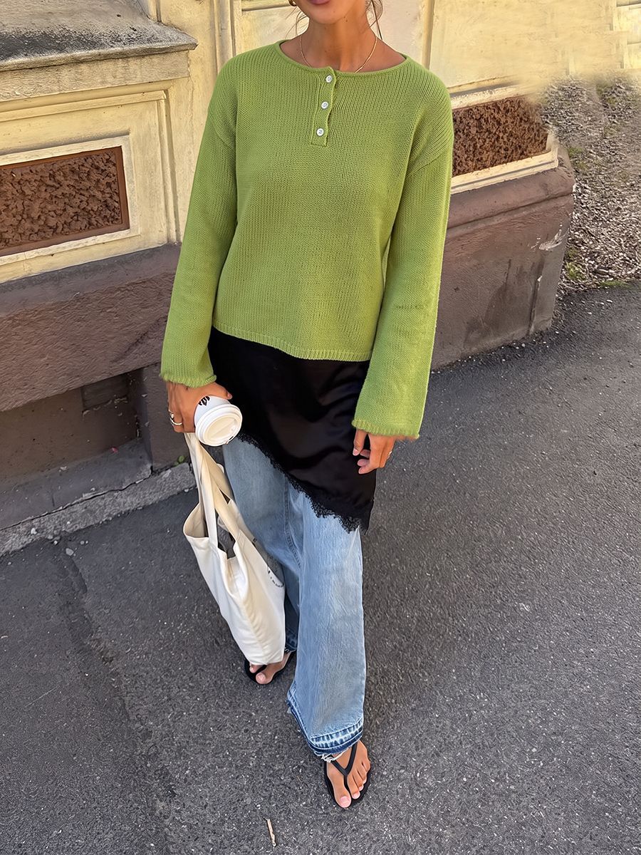 Relaxed Henley Sweater with Button Placket in Green — front view on model with jeans
