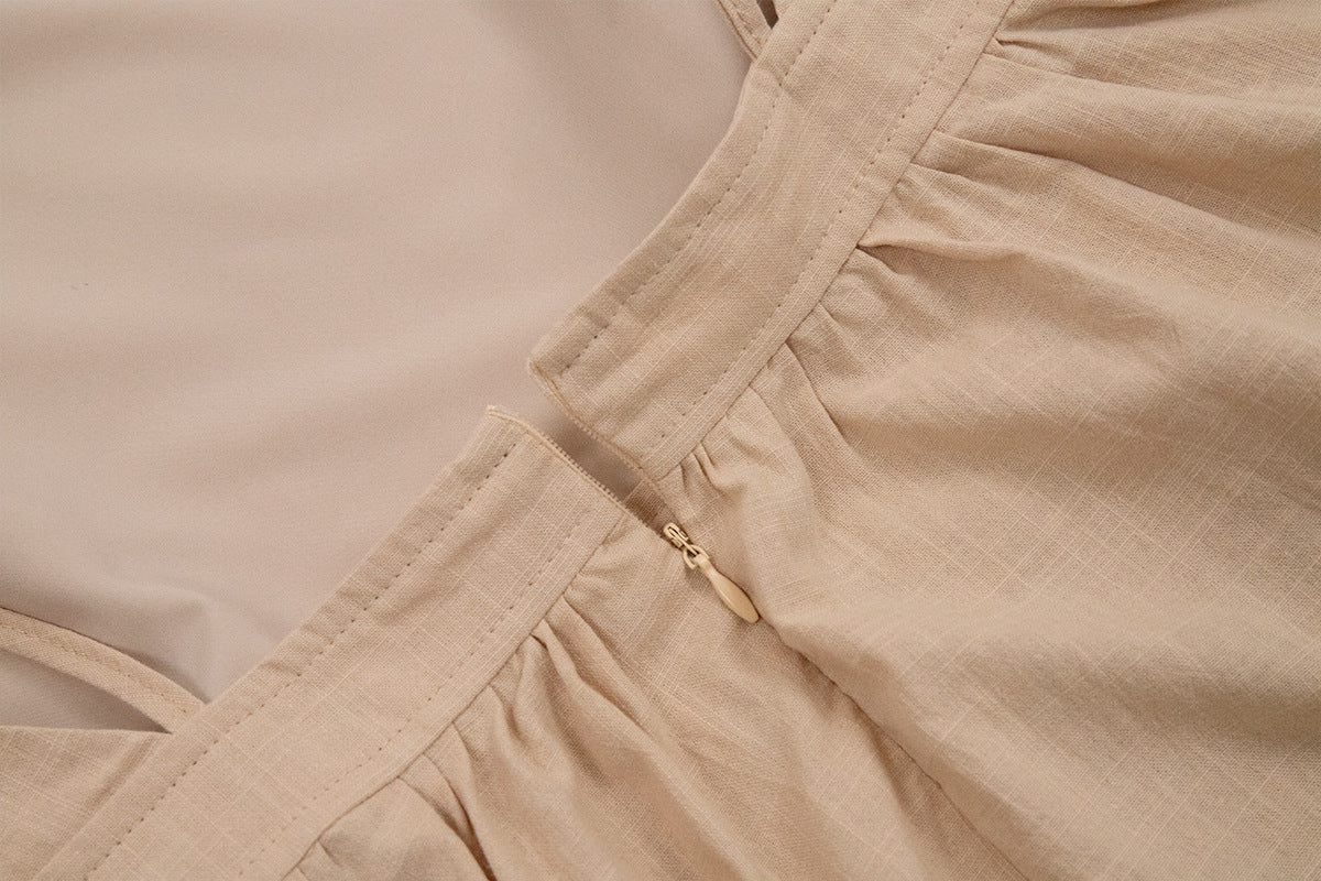 Tie-Shoulder Open-Back Cotton Maxi Dress in Apricot — close-up of the gathered waist seam