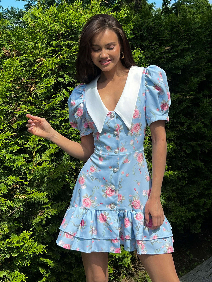 Floral Puff-Sleeve Mini Dress with Contrast Collar in Blue Floral — on model outdoors
