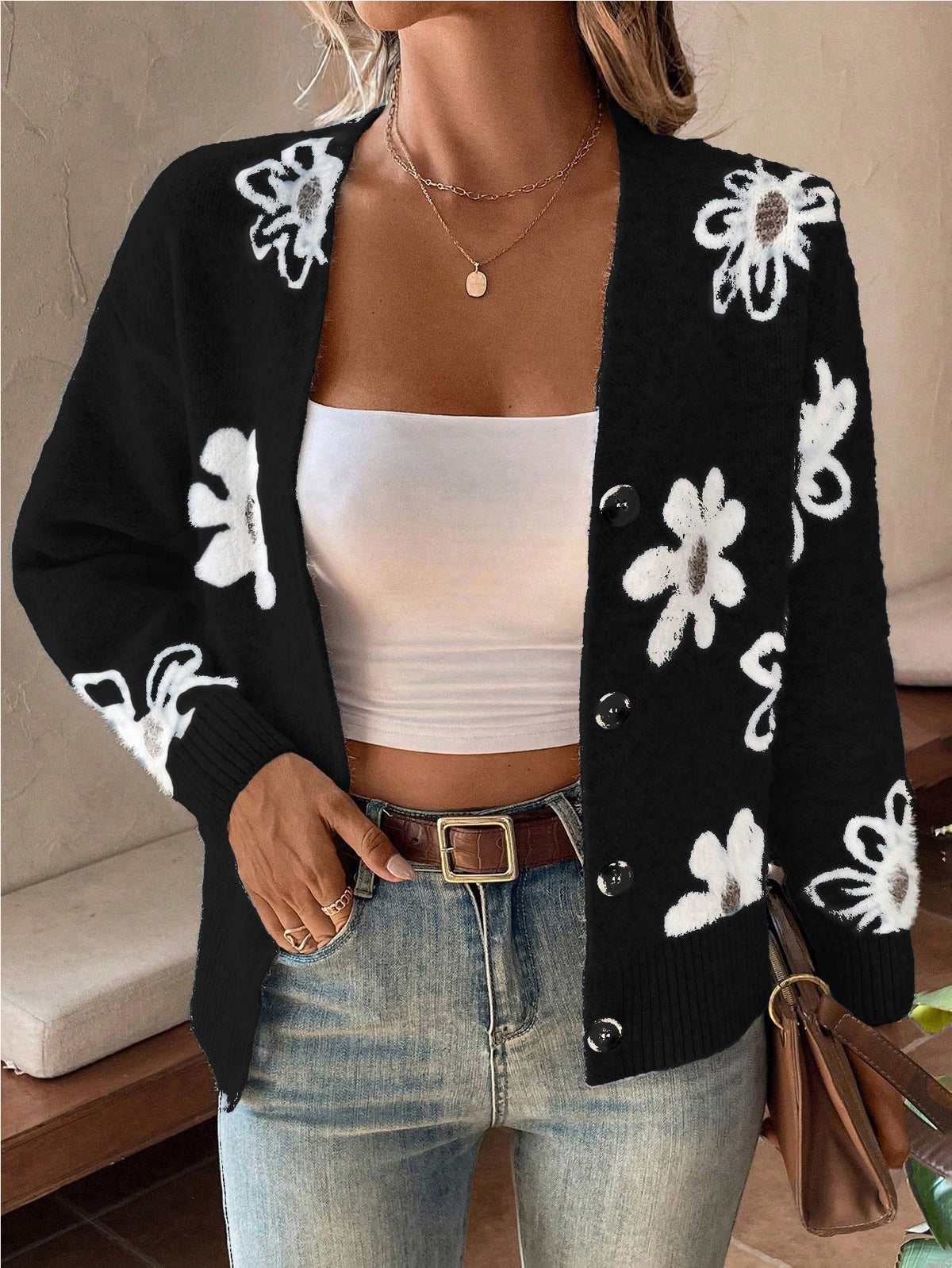 Daisy Knit Button-Front Cardigan in Black — front view on model