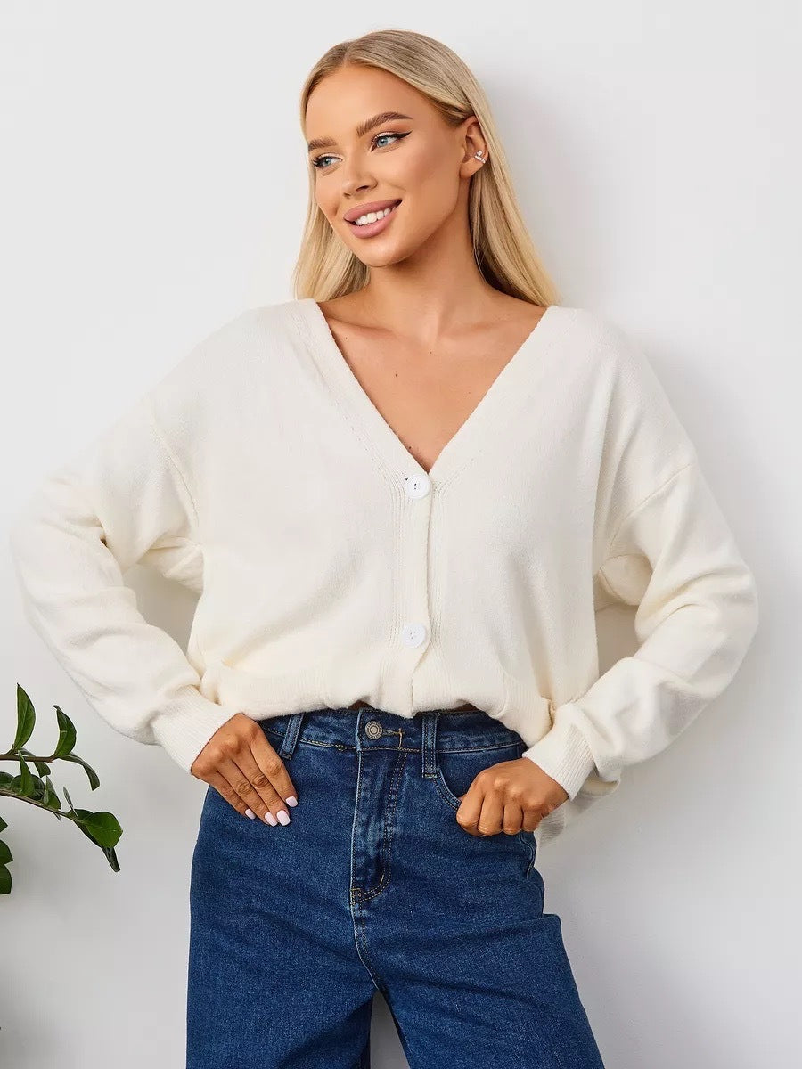 V-Neck Button Cardigan with Patch Pockets in Ivory — front view on model with jeans