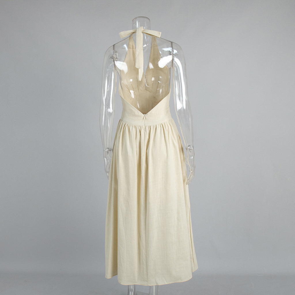 Cotton Halter V-Neck Maxi Dress in Apricot Cream — back view on mannequin