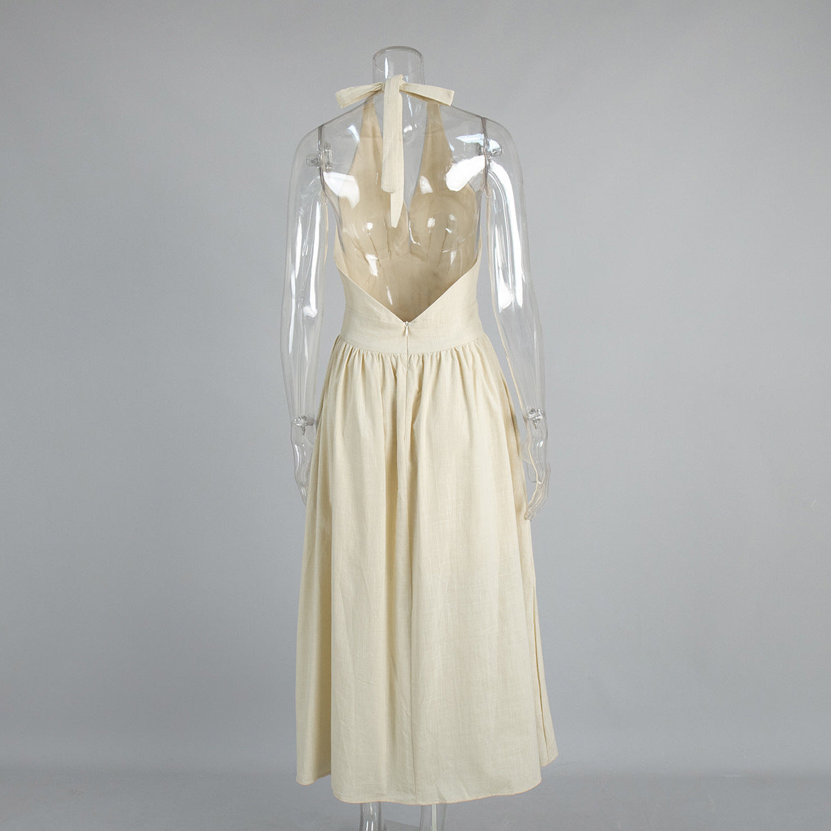 Cotton Halter V-Neck Maxi Dress in Apricot Cream — back view on mannequin